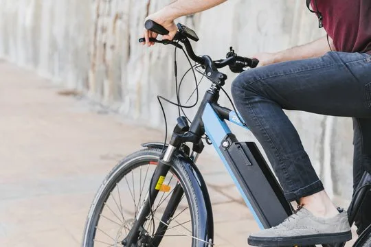 Electric-bike riding photograph from the Zephyr guide