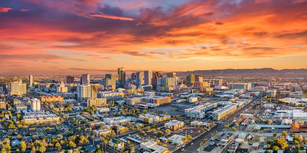 Phoenix skyline at sunset, from the original Zephyr leisure guide